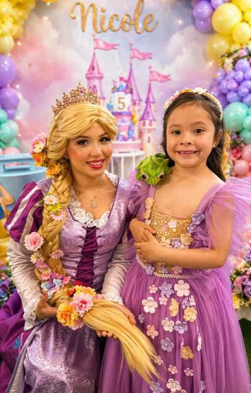 Rapunzel character with the birthday girl at a kids party in Houston